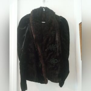 A woman's faux fur dress jacket from the 1980s